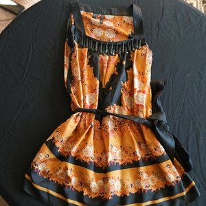 Black gold silk blouse with jewel neck detail